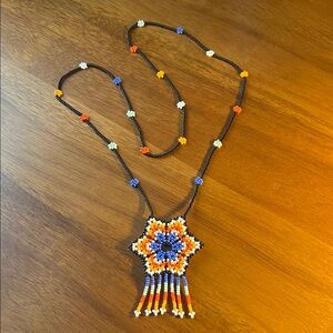 Handcrafted Beaded Necklace with Star Pendant